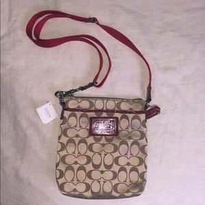 Coach - red cross body